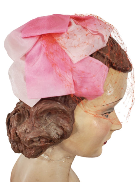 right side view of pink vintage veil hat