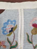 close-up showing expert embroidery and hand stitching