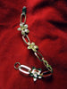 Bracelet fleurs dorées Art déco des années 40 par Krementz