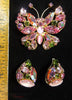 Vintage Regency Pink AB Butterfly Brooch and Earrings Demi Parure at Better Dresses Vintage. - black background and ruler