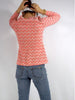 back view of 1970s orange chevrons jacket