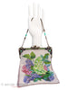 Vera holding Antique Microbeaded Purse