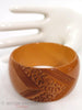 40s Butterscotch Wide Carved Bakelite Bangle - close view