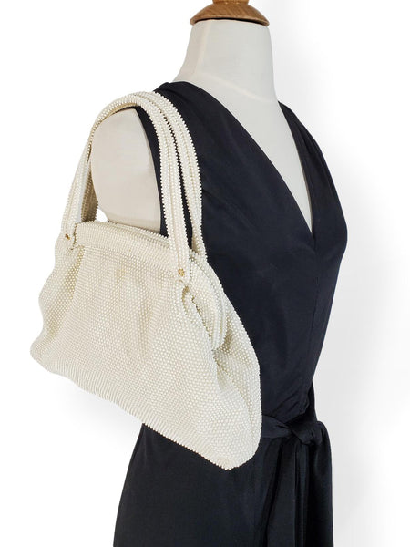 60s beaded handbag on shoulder