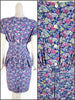 back view of 1980s peplum dress in rayon floral