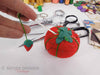 sewing lot - tomato with measuring tape