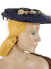 Side view of 1950s navy blue straw veil hat