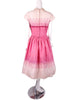 Back view of silk 1950s pink party dress