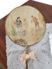 Close view of antique silk fan