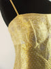 Robe droite dorée années 50 par Adele Simpson