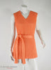 Sears 1960s peach crochet mini dress at Better Dresses Vintage. Knot at hip.