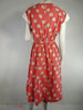 Soviet-era red daisy print day dress at Better Dresses Vintage. Back view.