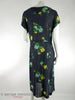 1930s to 40s black rayon day dress with yellow and green roses at Better Dresses Vintage. Back view.
