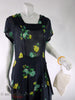 1930s to 40s black rayon day dress with yellow and green roses at Better Dresses Vintage. Close with purse.