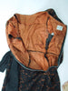Robe en dentelle noire des années 50/60 sur robe orange Wiggle
