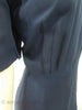 1940s Navy Rayon Crepe Dress by Herbert Levy at Better Dresses Vintage. Detail of bodice and waist.