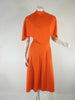 Robe et capelet orange Lorrie Deb des années 70