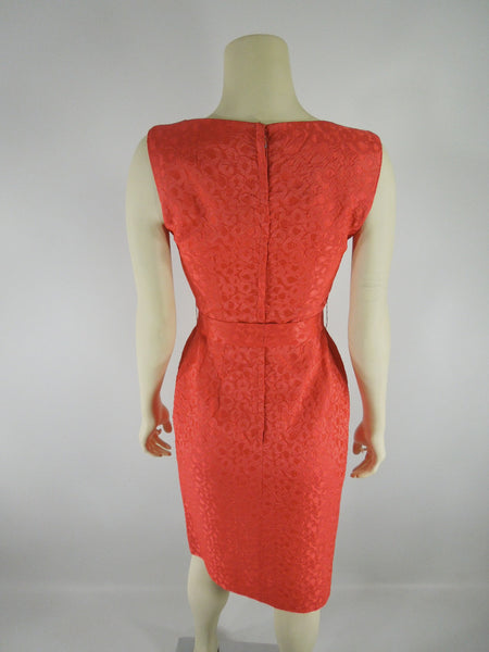 Vintage 50s 60s orange plisse wiggle dress by Ann Barry at Better Dresses Vintage. Back view.