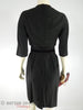 50s black Henry Lee cocktail dress at Better Dresses Vintage. back view with belt.