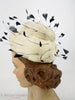 1950s/60s feather hat by Evelyn Varon at Better Dresses Vintage. - On Jane, side.