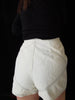 50s High-Waist Shorts - on a person, back