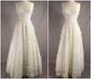 Robe de mariée sans bretelles en dentelle blanche des années 50