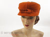 Chapeau orange mod des années 60