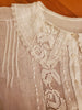 Tucks and lace detail on antique blouse