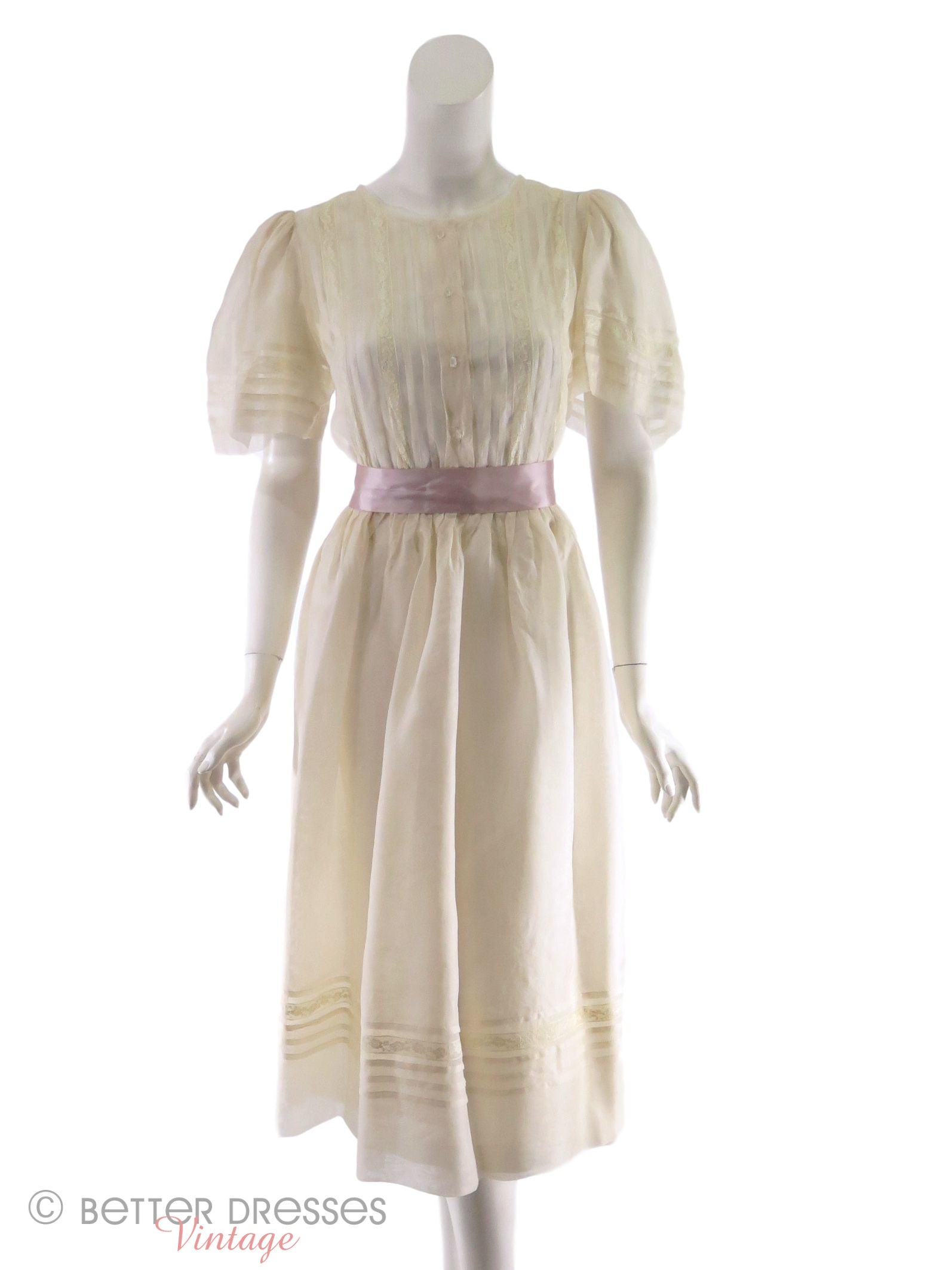 cream silk dress vintage Bias cut cream silk satin wedding gown with white floral lace bodice. Covered buttons and self belt, made in Europe in the early part of the 1930s. In store and online now. #