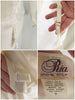 garters detail and Ria Designs label