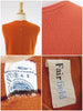 details and tags of Fairfield burnt orange vintage sweater