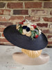 Mid-Century Platter Hat With Floral Crown, Angled back View