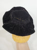 back view of mid-century velvet wide brim hat