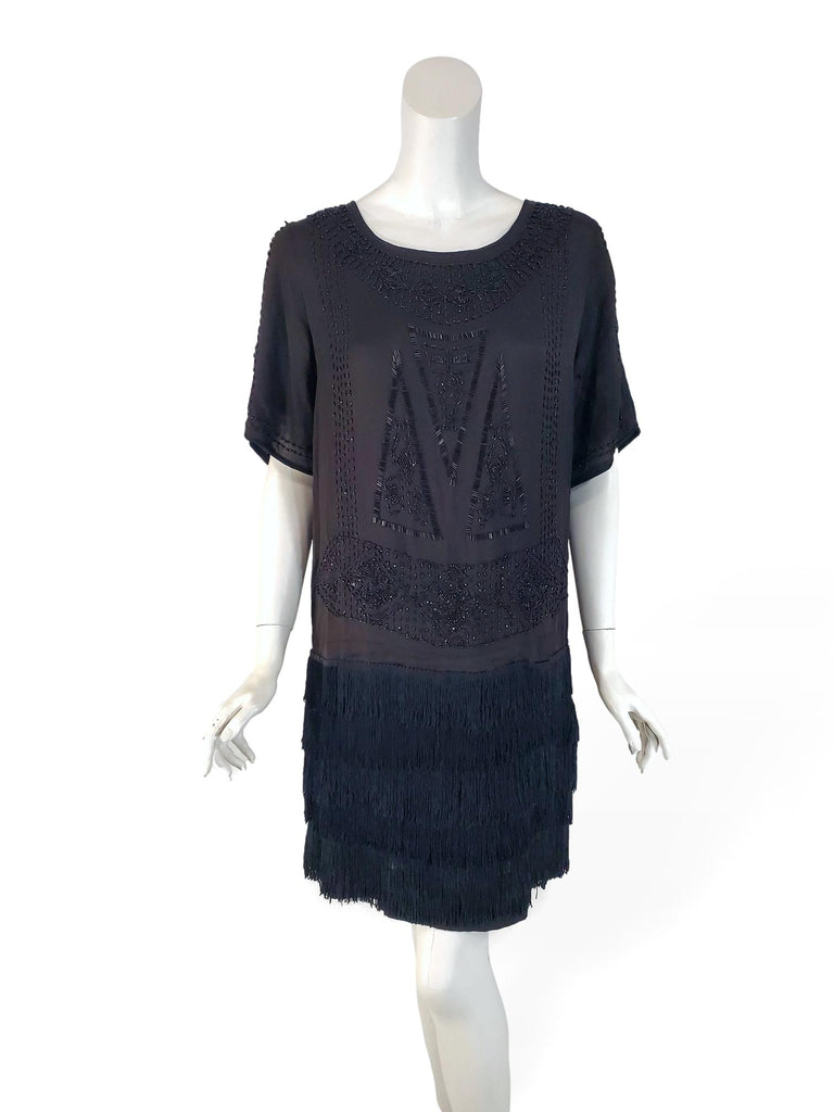 front view of black beaded and fringed 1920s dress