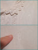 repairs to small holes in dressing gown