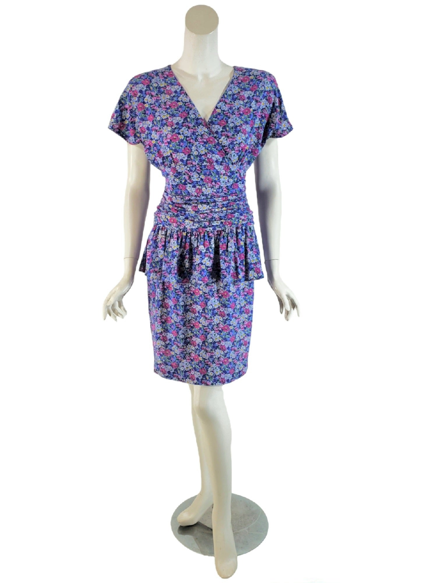 1980s peplum dress Incredibly well made retro reproduction! 1940s style red & white floral crepe peplum dress with velvet ribbon detail, small-26 waist $75 1980s red woven sun hat with white ribbon $35 1960s